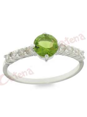 Ασημένιο δαχτυλίδι επιπλατινωμένο με άσπρες πέτρες ζιργκόν και πράσινη στο κέντρο