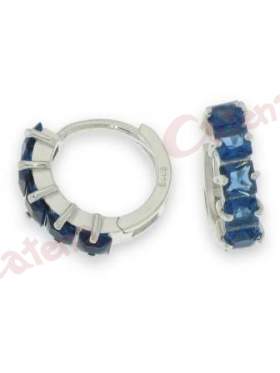 Σκουλαρίκια ασημένια επιπλατινωμένα με μπλε πέτρες ζιργκόν σε σχέδιο κρίκο