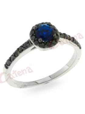 Δαχτυλίδι ασημένιο,επιπλατινωμένο με μαύρες και μπλε πέτρες ζιργκόν