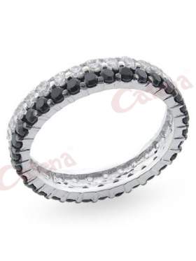 Δαχτυλίδι ασημένιο επιπλατινωμένο με άσπρες μαύρες πέτρες ζιργκόν σε σχέδιο ολόβερο